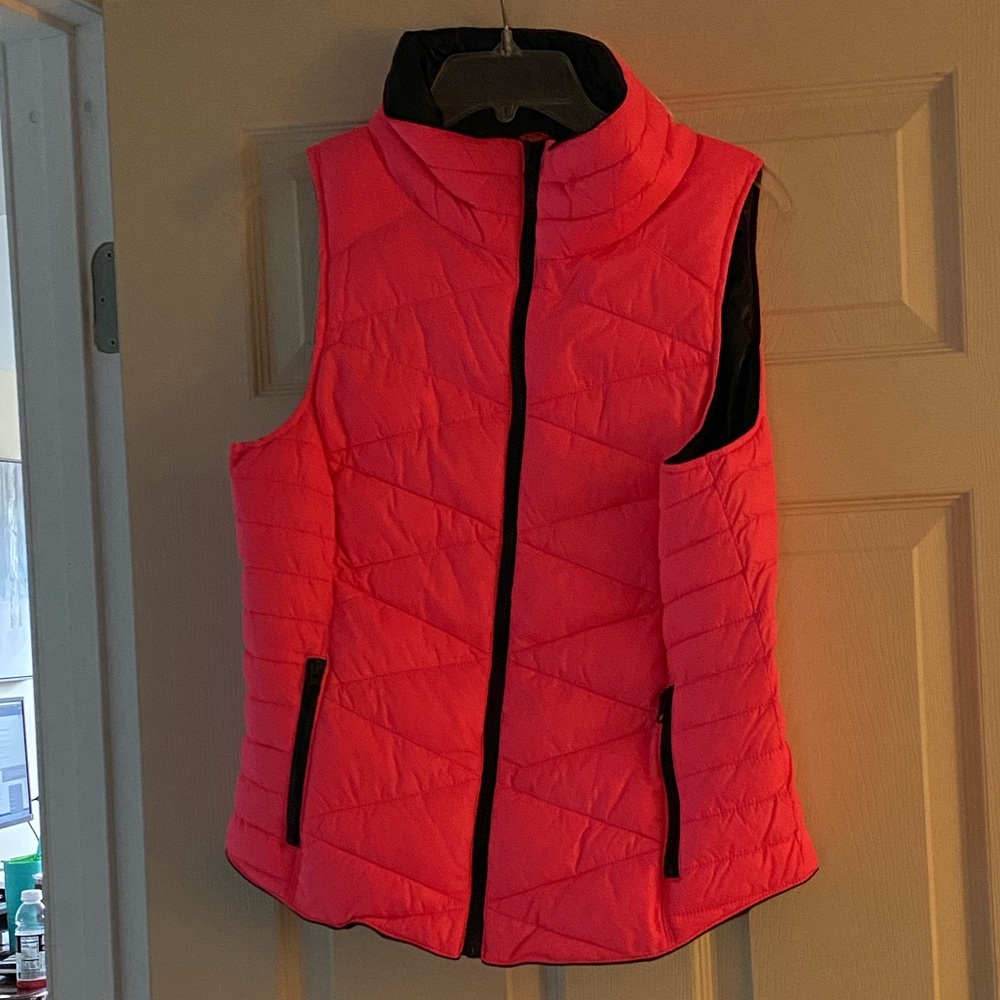 Pink and black vest